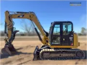 2018 Caterpillar 308E2 CR mini excavator with compact radius, swing boom, and high-definition hydraulic system for confined space construction and trenching.