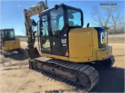 2018 Caterpillar 308E2 CR mini excavator with compact radius, swing boom, and high-definition hydraulic system for confined space construction and trenching.