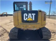 2018 Caterpillar 308E2 CR mini excavator with compact radius, swing boom, and high-definition hydraulic system for confined space construction and trenching.
