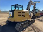 2018 Caterpillar 308E2 CR mini excavator with compact radius, swing boom, and high-definition hydraulic system for confined space construction and trenching.