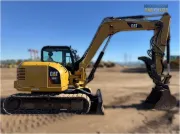 2018 Caterpillar 308E2 CR mini excavator with compact radius, swing boom, and high-definition hydraulic system for confined space construction and trenching.