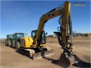 2018 Caterpillar 308E2 CR mini excavator with compact radius, swing boom, and high-definition hydraulic system for confined space construction and trenching.