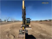 2018 Caterpillar 308E2 CR mini excavator with compact radius, swing boom, and high-definition hydraulic system for confined space construction and trenching.