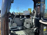 2018 Caterpillar 308E2 CR mini excavator with compact radius, swing boom, and high-definition hydraulic system for confined space construction and trenching.