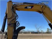 2018 Caterpillar 308E2 CR mini excavator with compact radius, swing boom, and high-definition hydraulic system for confined space construction and trenching.
