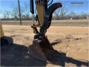 2018 Caterpillar 308E2 CR mini excavator with compact radius, swing boom, and high-definition hydraulic system for confined space construction and trenching.