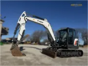2020 Bobcat E85 compact excavator with reduced tail swing, turbocharged diesel engine, and advanced hydraulics for heavy digging and site development.