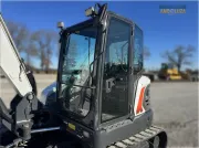 2020 Bobcat E85 compact excavator with reduced tail swing, turbocharged diesel engine, and advanced hydraulics for heavy digging and site development.