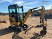 2020 Caterpillar 301.8 mini excavator with expandable undercarriage, stick steer travel mode, and tilt-up canopy for easy maintenance in tight construction spaces.