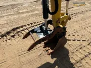 2020 Caterpillar 301.8 mini excavator with expandable undercarriage, stick steer travel mode, and tilt-up canopy for easy maintenance in tight construction spaces.