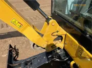 2020 Caterpillar 301.8 mini excavator with expandable undercarriage, stick steer travel mode, and tilt-up canopy for easy maintenance in tight construction spaces.