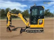 2020 Caterpillar 301.8 mini excavator with expandable undercarriage, stick steer travel mode, and tilt-up canopy for easy maintenance in tight construction spaces.