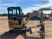 2020 Caterpillar 301.8 mini excavator with expandable undercarriage, stick steer travel mode, and tilt-up canopy for easy maintenance in tight construction spaces.