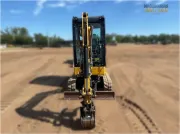 2020 Caterpillar 301.8 mini excavator with expandable undercarriage, stick steer travel mode, and tilt-up canopy for easy maintenance in tight construction spaces.