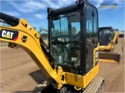 2020 Caterpillar 301.8 mini excavator with expandable undercarriage, stick steer travel mode, and tilt-up canopy for easy maintenance in tight construction spaces.