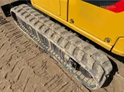 2020 Caterpillar 301.8 mini excavator with expandable undercarriage, stick steer travel mode, and tilt-up canopy for easy maintenance in tight construction spaces.