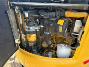 2020 Caterpillar 301.8 mini excavator with expandable undercarriage, stick steer travel mode, and tilt-up canopy for easy maintenance in tight construction spaces.