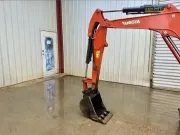 2020 Kubota U27-4 mini excavator with zero tail swing, Kubota original direct injection engine, and spacious cab for professional excavation in confined urban areas.