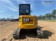 2024 Caterpillar 305 CR mini excavator with compact radius, stick steer travel mode, and high-performance hydraulics for precision digging and utility work.