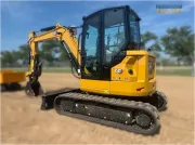 2024 Caterpillar 305 CR mini excavator with compact radius, stick steer travel mode, and high-performance hydraulics for precision digging and utility work.