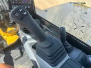 2024 Caterpillar 305 CR mini excavator with compact radius, stick steer travel mode, and high-performance hydraulics for precision digging and utility work.