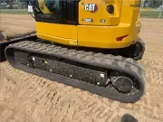 2024 Caterpillar 305 CR mini excavator with compact radius, stick steer travel mode, and high-performance hydraulics for precision digging and utility work.